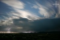 Lightning, the moon behind the clouds, "Laguna de Pozuelos", on the Andean Altiplano (Puna), province of Jujuy, Argentina