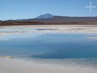 Water 'eye' on the Tolar Grande salt flat, on the Altiplano (Puna) of Salta, Argentina Water 'eye' on the Tolar Grande salt flat, on the Altiplano (Puna) of Salta, Argentina